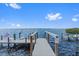 Beautiful waterfront views from the private dock for serene waterside experience and enjoyment at 676 Regatta Way, Bradenton, FL 34208