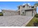 Stunning home with multi-car garage and stylish brick paver driveway at 676 Regatta Way, Bradenton, FL 34208
