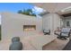 Outdoor fireplace with comfortable seating, perfect for relaxing evenings at 676 Regatta Way, Bradenton, FL 34208