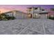 Stunning home boasts a spacious driveway, three-car garage, and manicured landscaping at 676 Regatta Way, Bradenton, FL 34208