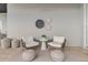 Outdoor patio featuring neutral-colored seating and decor at 676 Regatta Way, Bradenton, FL 34208