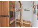 Modern cedar sauna featuring glass enclosure and bench seating at 676 Regatta Way, Bradenton, FL 34208