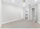 Neutral bedroom with carpet, ceiling fan and closet space at 7661 Summerland Cv, Bradenton, FL 34202