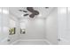 Bedroom with ceiling fan and window overlooking the exterior at 7661 Summerland Cv, Bradenton, FL 34202