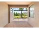 Screened patio features brick flooring and an exterior view at 7661 Summerland Cv, Bradenton, FL 34202