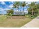 Shoreview at Lakewood Ranch Waterside entrance sign surrounded by beautiful landscaping and palm trees at 7781 Grande Shores Dr, Sarasota, FL 34240