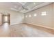 Airy main bedroom with a tray ceiling, recessed lighting, and several windows offering ample natural light at 7781 Grande Shores Dr, Sarasota, FL 34240