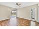 Bedroom features wood floors and sliding doors leading to the back patio at 8258 San Jacinto Ave, North Port, FL 34287