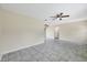 Open-concept living room with tile flooring and neutral paint, providing a blank canvas at 8258 San Jacinto Ave, North Port, FL 34287