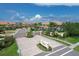 Aerial view of the Miramar community gate, entrance, and well-manicured landscaping at 8261 Miramar Way # 8261, Lakewood Ranch, FL 34202