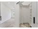Walk-in closet with ample storage featuring rod and shelf organizers at 8261 Miramar Way # 8261, Lakewood Ranch, FL 34202
