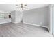 Spacious living area features modern floors and neutral tones at 8429 Malcolm Ave, North Port, FL 34287