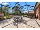 Spacious patio with a jacuzzi, plenty of seating, and stunning backyard views at 8445 Lone Eagle Way, Sarasota, FL 34241