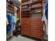 Well-organized walk-in closet with custom shelves, drawers, and ample storage space at 8445 Lone Eagle Way, Sarasota, FL 34241