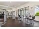 Well-equipped fitness center with modern exercise machines and mirrored walls at 8641 Rain Song Rd, Sarasota, FL 34238