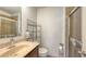 Bathroom featuring a shower stall, vanity with sink, and tile at 8907 White Sage Loop, Lakewood Ranch, FL 34202