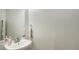 Bathroom featuring a stylish vessel sink, modern fixtures, and a towel at 8907 White Sage Loop, Lakewood Ranch, FL 34202