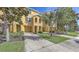 Charming multi-level townhome featuring well-maintained landscaping, front yard and private garage at 8907 White Sage Loop, Lakewood Ranch, FL 34202