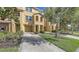 Well-maintained townhouse with garage, small front yard, and sidewalk access at 8907 White Sage Loop, Lakewood Ranch, FL 34202