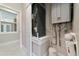Utility room with water heater and filtration system, and closet at 920 Lena Ln, Sarasota, FL 34240