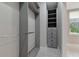 Walk-in closet with built-in shelves and drawers at 920 Lena Ln, Sarasota, FL 34240