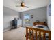 Charming bedroom with a ceiling fan, window, and plenty of natural light at 9927 58Th E St, Parrish, FL 34219