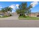 Charming home featuring a well-maintained lawn, an attached two-car garage and beautiful landscaping at 9927 58Th E St, Parrish, FL 34219