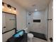 Modern bathroom with tiled shower, vessel sink, and updated fixtures at 1019 34Th W Ave, Bradenton, FL 34205