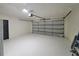 A clean, spacious garage with an automatic door at 1019 34Th W Ave, Bradenton, FL 34205