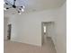 Bright living room showcases stylish lighting fixture and open floor plan at 1019 34Th W Ave, Bradenton, FL 34205