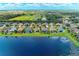 Scenic aerial view of waterfront homes in a peaceful neighborhood with well-maintained lawns at 12851 24Th Street E Cir, Parrish, FL 34219