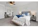 Spacious bedroom with natural light, carpet flooring, and a cozy sitting area with desk at 16419 Paynes Mill Dr, Bradenton, FL 34211