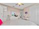 Decorated bedroom with star wall decals, a white vanity and view of the lawn at 16419 Paynes Mill Dr, Bradenton, FL 34211