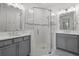 Modern main bathroom showcasing dual sinks, a glass-enclosed shower, and sleek fixtures at 16419 Paynes Mill Dr, Bradenton, FL 34211