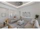Bright living room with modern decor, hardwood floors, and recessed lighting at 16511 Cornwall Ln, Lakewood Ranch, FL 34202