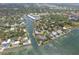 Stunning aerial view of waterfront homes and the condo community at 1709 N Tamiami Trail # Ph 514, Sarasota, FL 34234