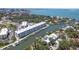 Fantastic aerial view of the condo and surrounding waterfront neighborhood at 1709 N Tamiami Trail # Ph 514, Sarasota, FL 34234