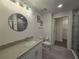 This bathroom features a modern vanity, framed mirror, and sleek fixtures at 1709 N Tamiami Trail # Ph 514, Sarasota, FL 34234