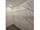 View of a walk-in closet with shelving, ideal for storage at 1709 N Tamiami Trail # Ph 514, Sarasota, FL 34234