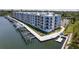 Modern condo building with boat slips and a waterfront view at 1709 N Tamiami Trail # Ph 514, Sarasota, FL 34234