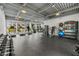 Spacious gym with cardio machines, weightlifting equipment, and free weights for residents at 1709 N Tamiami Trail # Ph 514, Sarasota, FL 34234