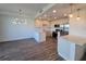 Modern kitchen features stainless steel appliances and a view of the dining area at 1709 N Tamiami Trail # Ph 514, Sarasota, FL 34234