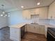 Modern kitchen featuring stainless appliances and bright lighting fixtures at 1709 N Tamiami Trail # Ph 514, Sarasota, FL 34234