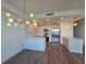 Modern kitchen features stainless steel appliances and a view of the dining area at 1709 N Tamiami Trail # Ph 514, Sarasota, FL 34234