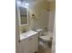 Bathroom with updated vanity, classic tilework, and new faucet and accessories at 201 Elliot Ave, Sarasota, FL 34232