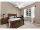 Comfortable bedroom with a large window, neutral color scheme, and ample natural light at 21705 67Th E Ave, Bradenton, FL 34211