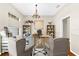 Bright office featuring hardwood floors, built-in shelving, and plenty of natural light from the large window at 21705 67Th E Ave, Bradenton, FL 34211