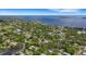 Beautiful aerial view of the neighborhood showcasing lush greenery, waterfront access, and community features at 218 32Nd W St, Bradenton, FL 34205