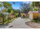 Spacious driveway leading to the detached garage and shed in the backyard at 218 32Nd W St, Bradenton, FL 34205