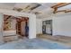 Unfinished basement ready for renovation, featuring an open floor plan, storage, and water heater at 218 32Nd W St, Bradenton, FL 34205